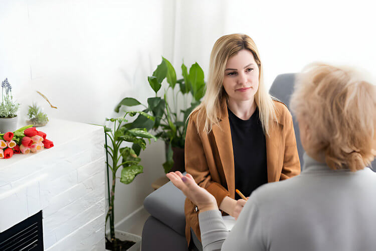 Counseling Services for Personal Growth, Compassionate therapist at Hebert Counseling helping a client navigate through personal challenges