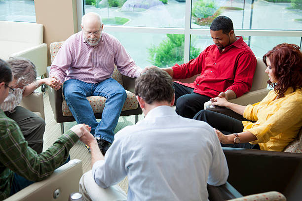 Counselor meeting with family to discuss stress, communication, and faith-centered support